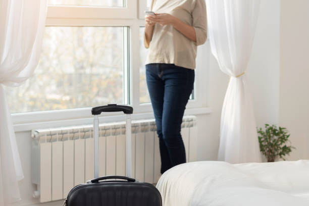 istock Young woman with  suitcase 644727304