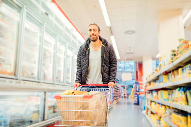 istock Young Man Groceries Shopping 644727522