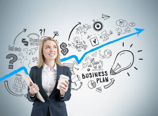 istock Smiling woman, business plan and blue graph 644727662