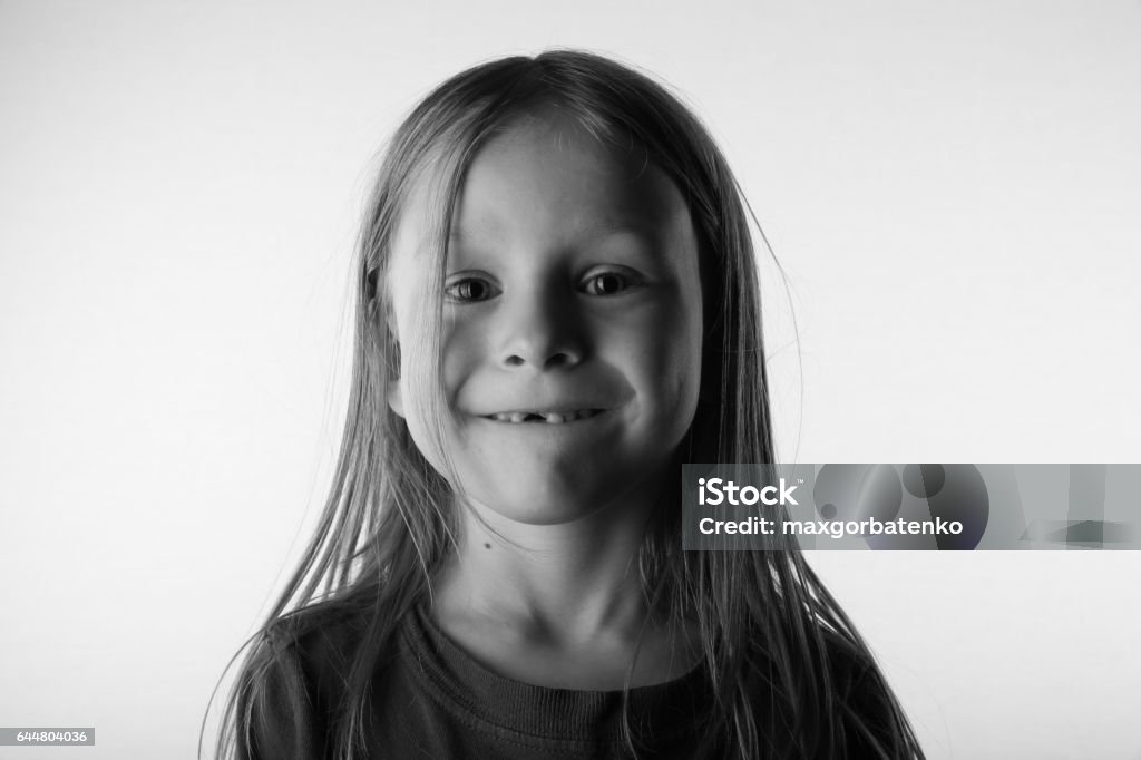 An 7 Year Old Boy With Long Hair Showing Missing Tooth On White Background  Stock Photo - Download Image Now - iStock