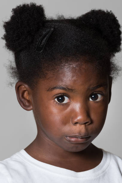 istock Little girl posing on gray background 644806574