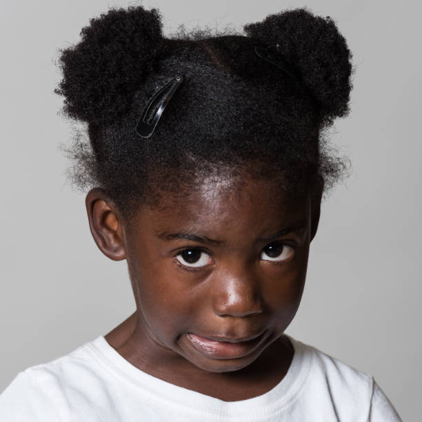 istock Little girl posing on gray background 644806680