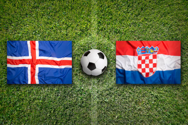 istock Iceland vs. Croatia flags on soccer field 644807002