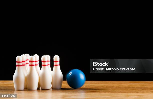 Bowling Pins And Bowling Ball In Miniature Stock Photo - Download Image Now - American Football - Sport, Bowling Ball, Bowling Pin