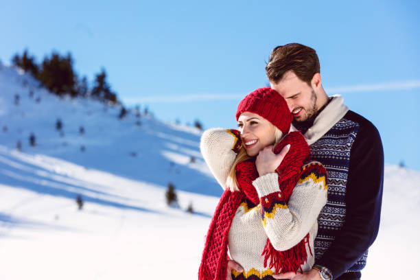 istock Happy Couple Having Fun on snow mountain. 644855574
