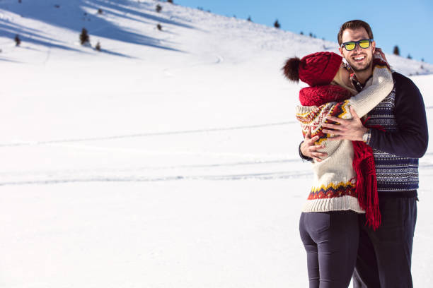 istock Happy Couple Having Fun on snow mountain. 644855996