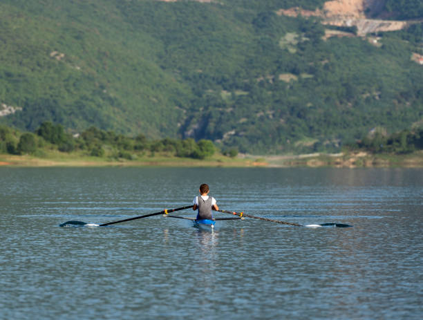 istock Child in the course of rowing on single 644881204