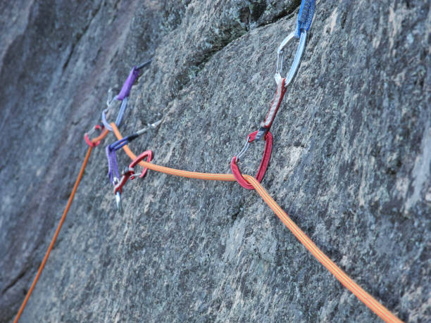 istock Rope Running Through Rock Climbing Gear That Was Placed in a Crack 644913722