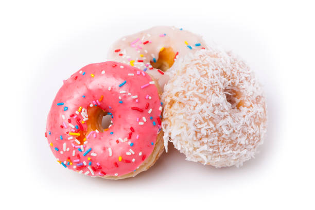istock Three donuts isolated on White Background. Pink, Frosted and Coconut with sprinkles. 644919486