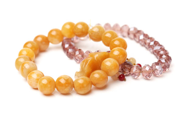 beads with precious stones on the animal's skin and oil