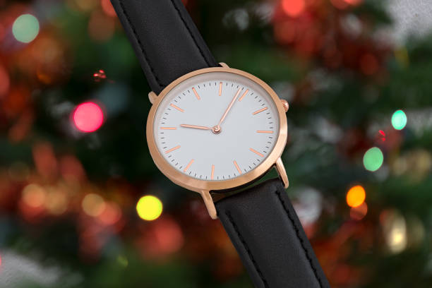 istock Black leather strap wrist watch in Christmas time 644923004