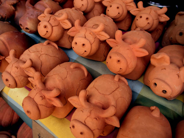 istock earthenware cow are smile for sale 644926406