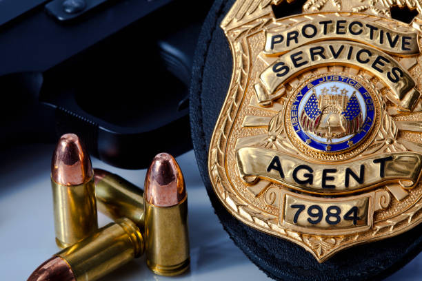 istock Police badge with firearm and bullets 644929732