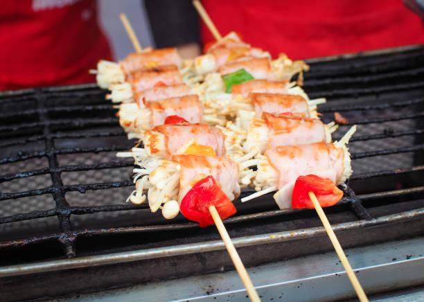 istock Barbecue skewers with sausage and mushrooms 644935310