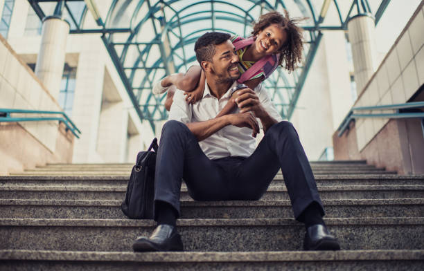 istock Happy African American girl having fun with her father. 644956310