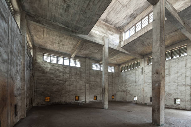 istock Interior of old and abandoned factory warehouse 644959350