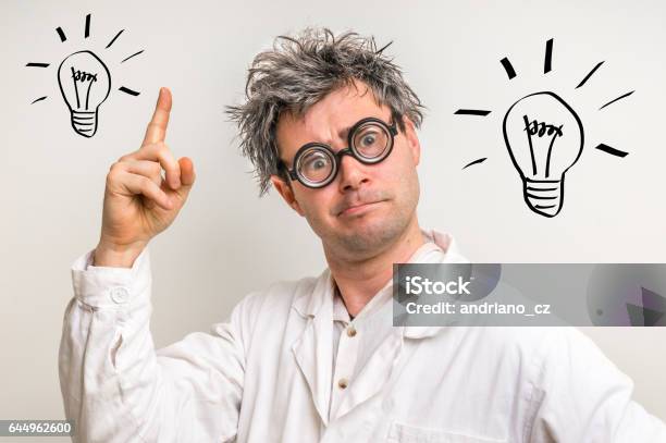 Crazy Scientist Got The Great Idea With Bulb Symbol Stock Photo - Download Image Now