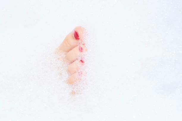istock Childs feet washing in bathroom 644966450