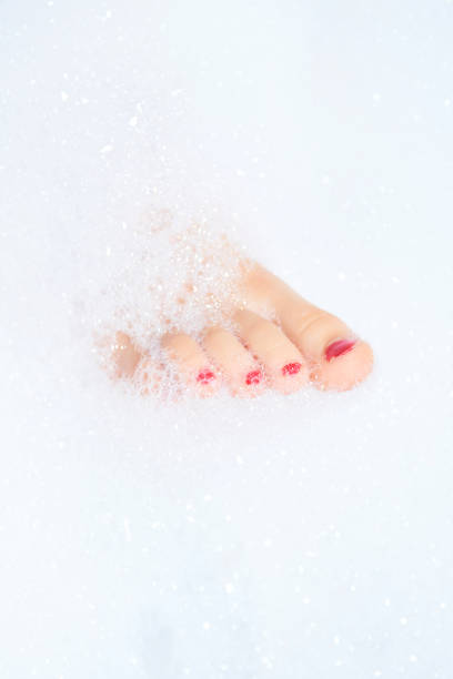 istock Childs feet washing in bathroom 644966456