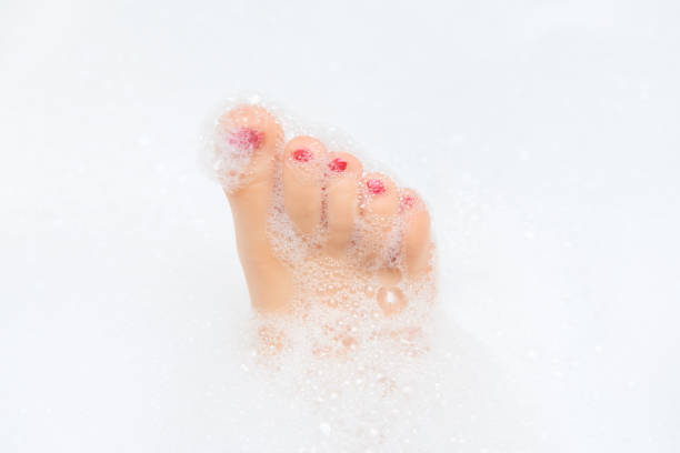 istock Childs feet washing in bathroom 644966476