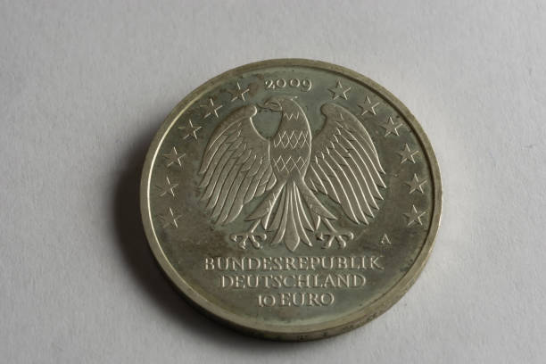istock Silver  euro coin on the table 644969148
