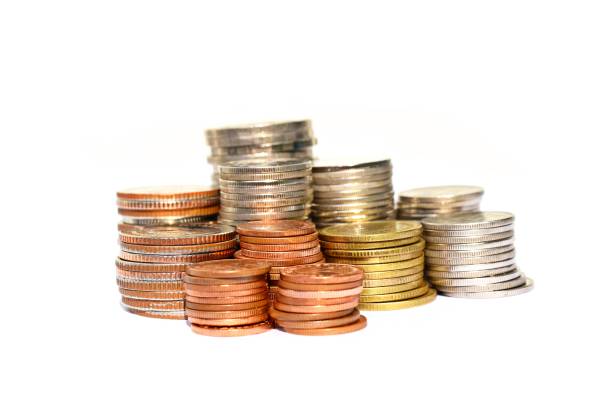istock Many stacks of coins in various sizes and valued 644973018