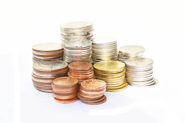 istock Many stacks of coins in various sizes and valued 644973020