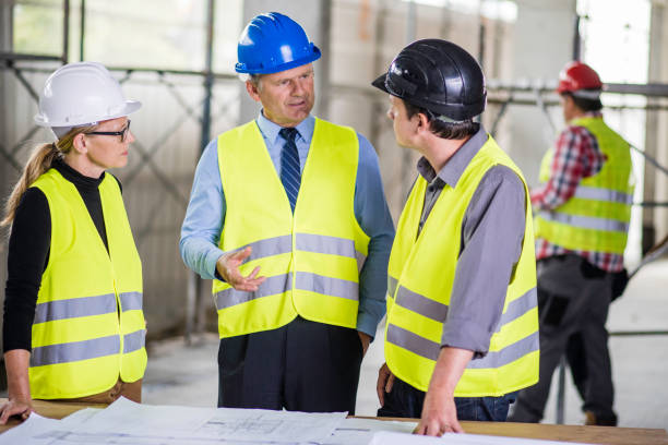 istock Businessman asking the construction foreman some questions 644977082