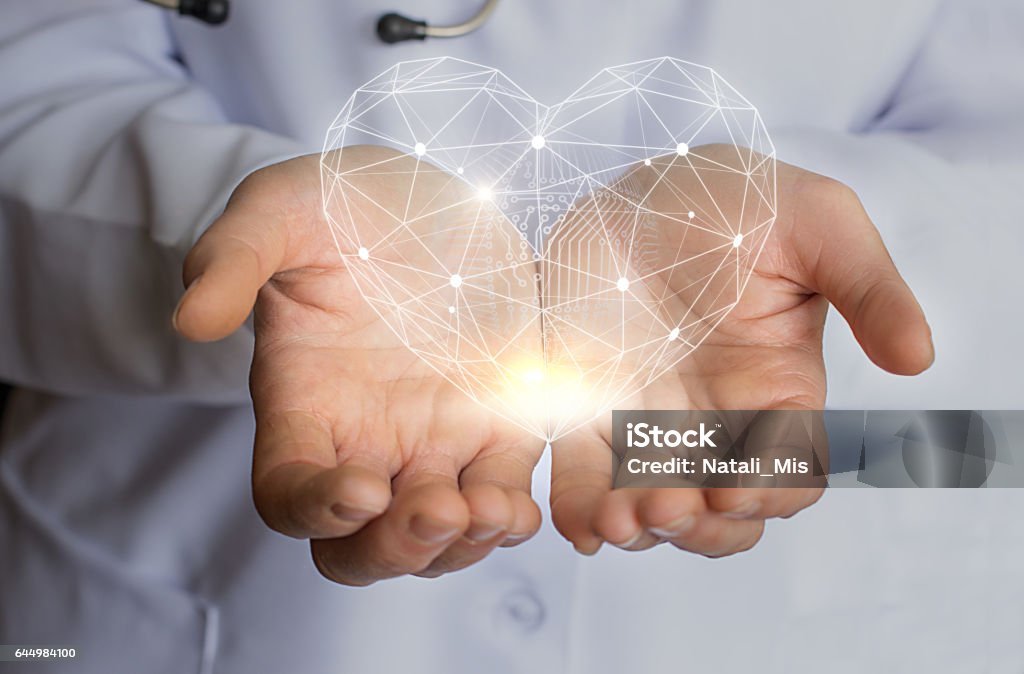 Modern Care treatment and support of the heart. Expertise Stock Photo