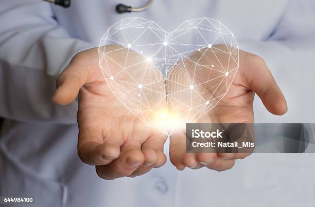 Modern Care Treatment And Support Of The Heart Stock Photo - Download Image Now - Expertise, Healthcare And Medicine, Healthy Lifestyle