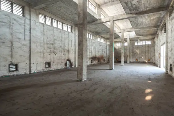 Photo of Interior of old and abandoned factory warehouse