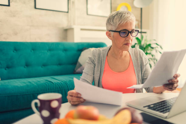 istock Mature woman Home budgeting 644987482