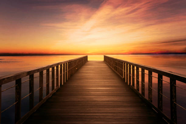 istock Bridge on calm sea at twilight time 644987672