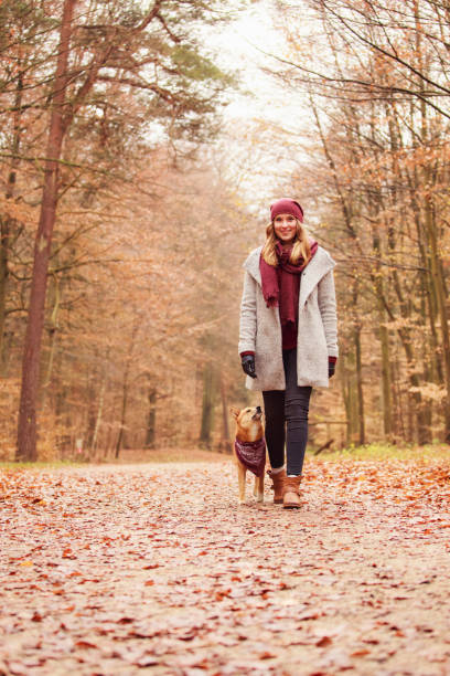 istock Young woman with her dog 644990304