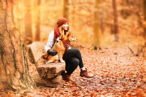 istock Young woman with her dog 644990312