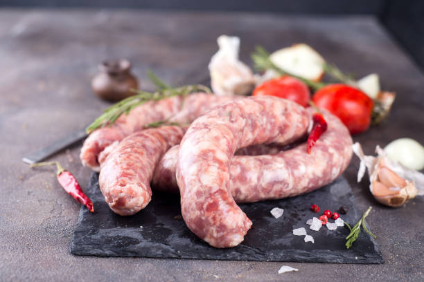 istock Raw sausages on slate 644993756