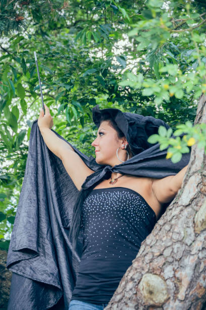 istock young sorceress in the forest 644993782