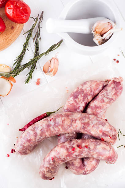 istock Raw sausages on slate 645002166