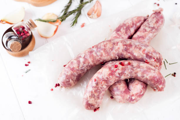 istock Raw sausages on slate 645002250