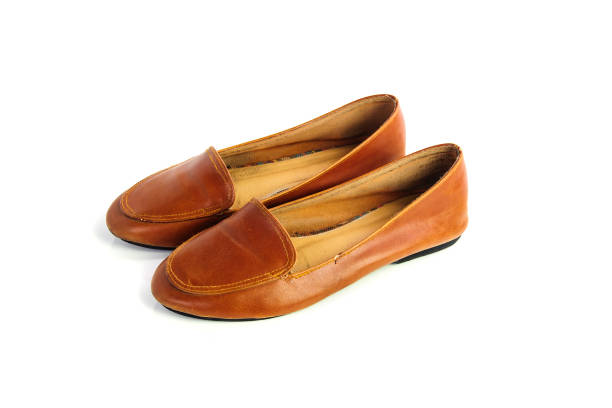 istock leather flat shoes isolated on white background 645009056