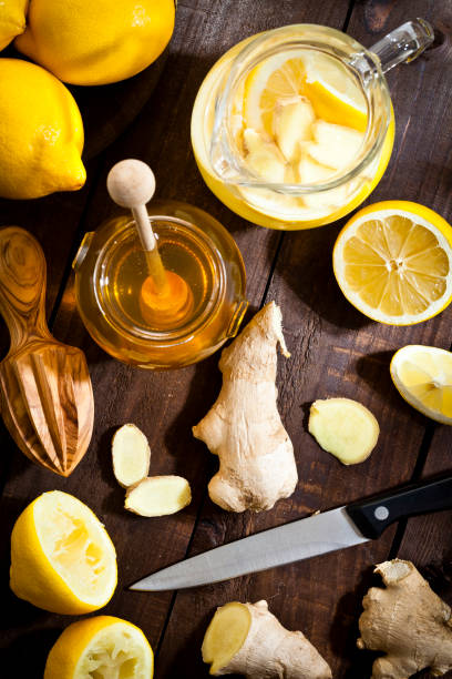 istock Preparing lemon infused water with honey and ginger 645016064