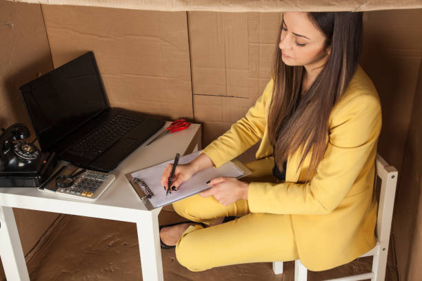 istock Young business woman sign documents, view from above 645022622