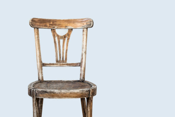 White chair on the black background