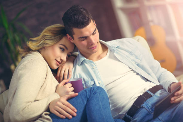 istock Young couple surfing on the web at home. 645056658