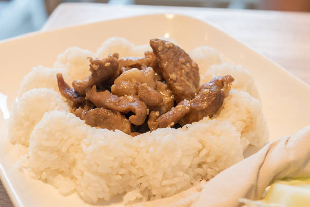 istock japanese rice with pepper fried pork on dish for lunch 645057612