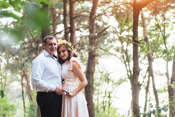 istock Walk a happy young couple on the nature 645060544