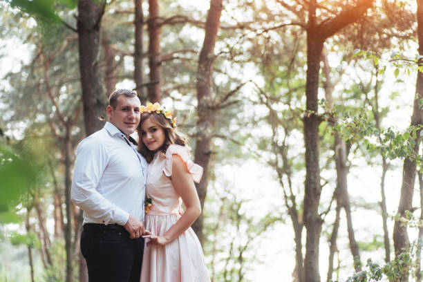 istock Walk a happy young couple on the nature 645060576