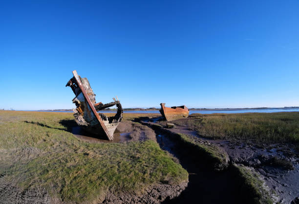 istock Two Ancient Boat Wrecks at Fleetwood 645061174