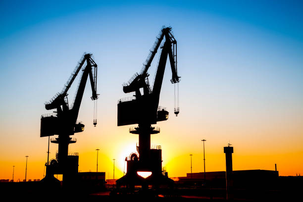 istock Wharf portal crane in the evening 645067484