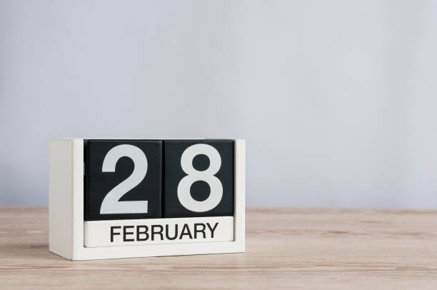 istock February 28th. Cube calendar for february 28 on wooden table with empty space For text. Not Leap year or intercalary day 645067956